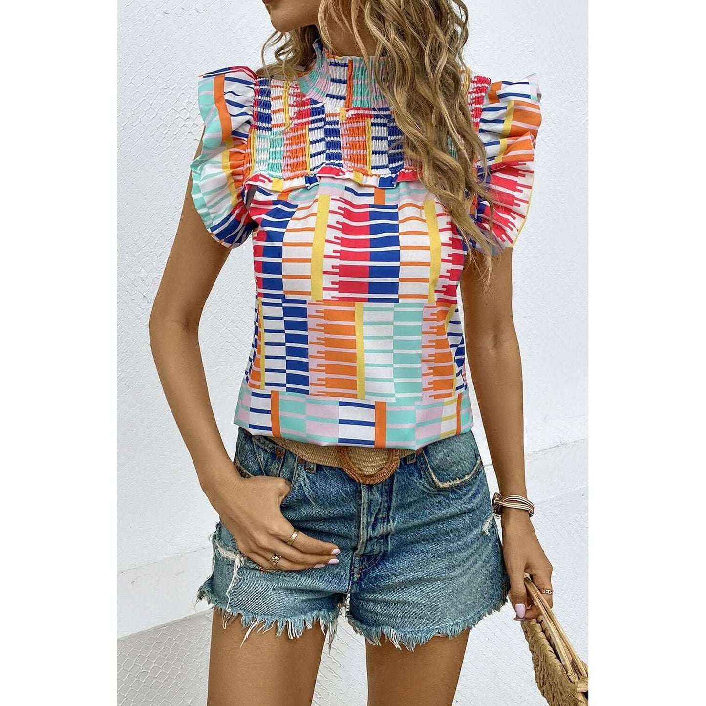 Blusa con mangas cortas y estampado de volantes